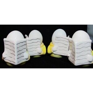 4 Vintage Faroy  Egg Cup Holders Pastel Yellow Sweater Reading Newspaper